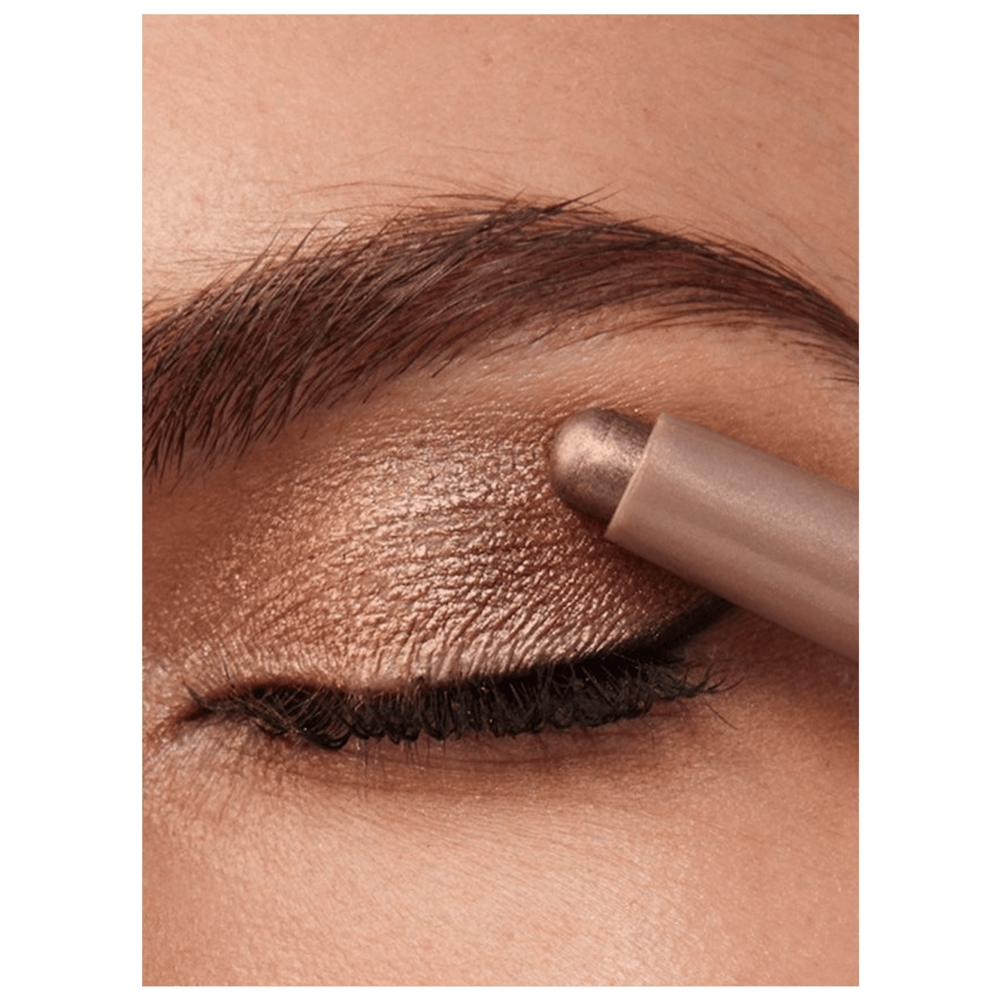 Eyebrow pencil being used on a person's eyebrow  available at skintash.pk