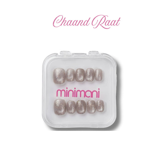 Minimani Chaand Raat press-on nail set, short silver cat-eye nails with holographic glitter