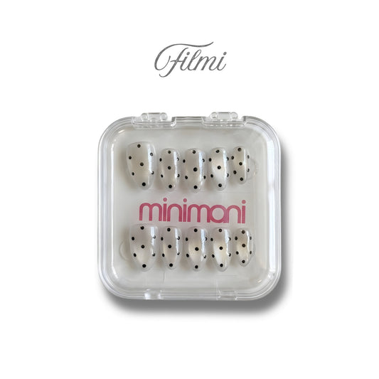 Minimani Filmi press-on nail set, milky almond nails with black polka dots
