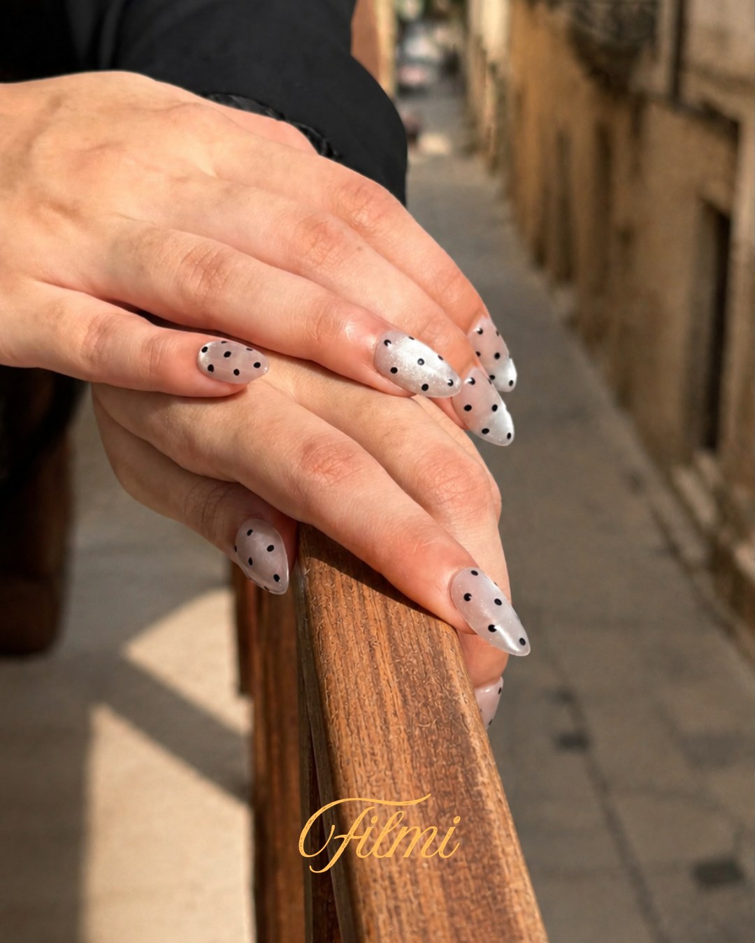 Minimani Filmi polka dot press-on nails worn on hand