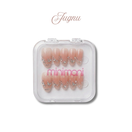 Minimani Jugnu press-on nail set, nude pink almond nails with silver butterflies and crystals