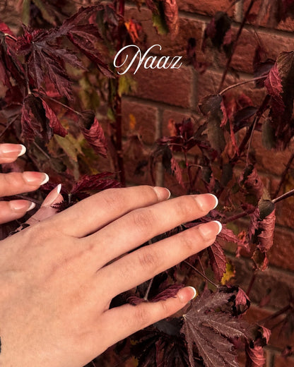 Minimani Naaz blush press-on nails worn on hand