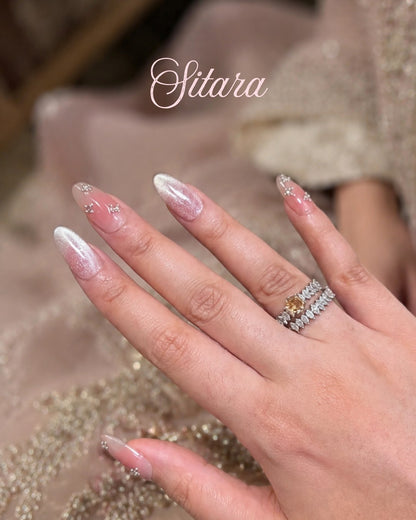 Minimani Sitara rhinestone press-on nails worn on hand