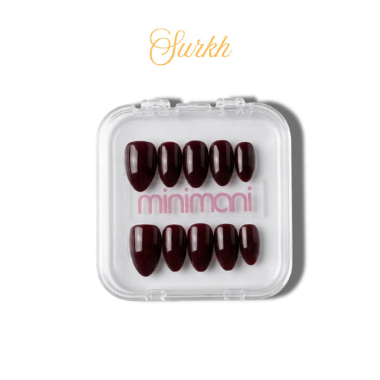 Minimani Surkh press-on nail set, glossy deep red almond nails in clear case
