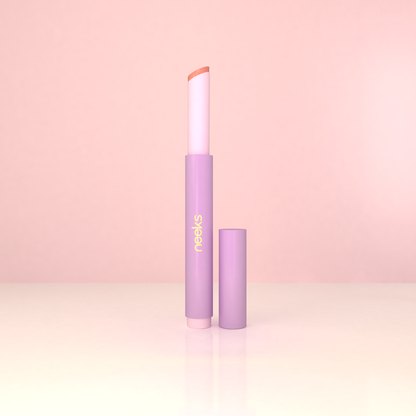 Neeks Kiss Theory Soft Caramel lip tint stick open showing warm caramel bullet