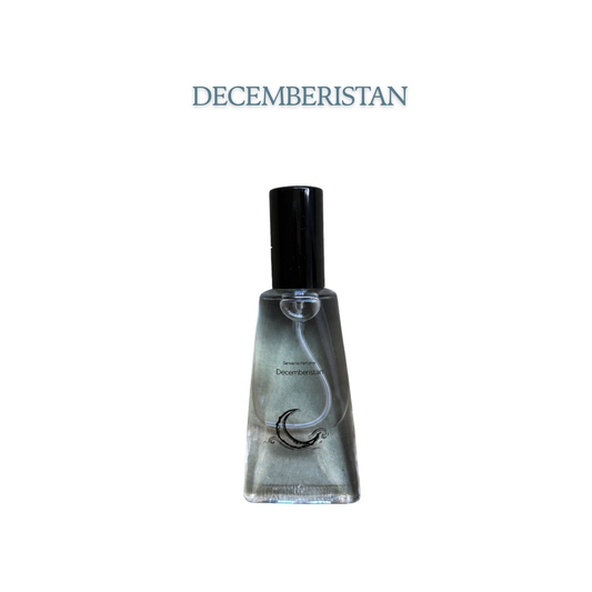 Sanvarna Decemberistan eau de parfum bottle with crescent moon artwork