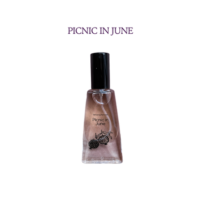 Sanvarna Picnic in June eau de parfum bottle with pomegranate artwork